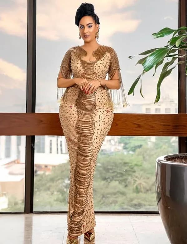 Gold Fringe Column: Crystal-studded mesh with gold chain fringe